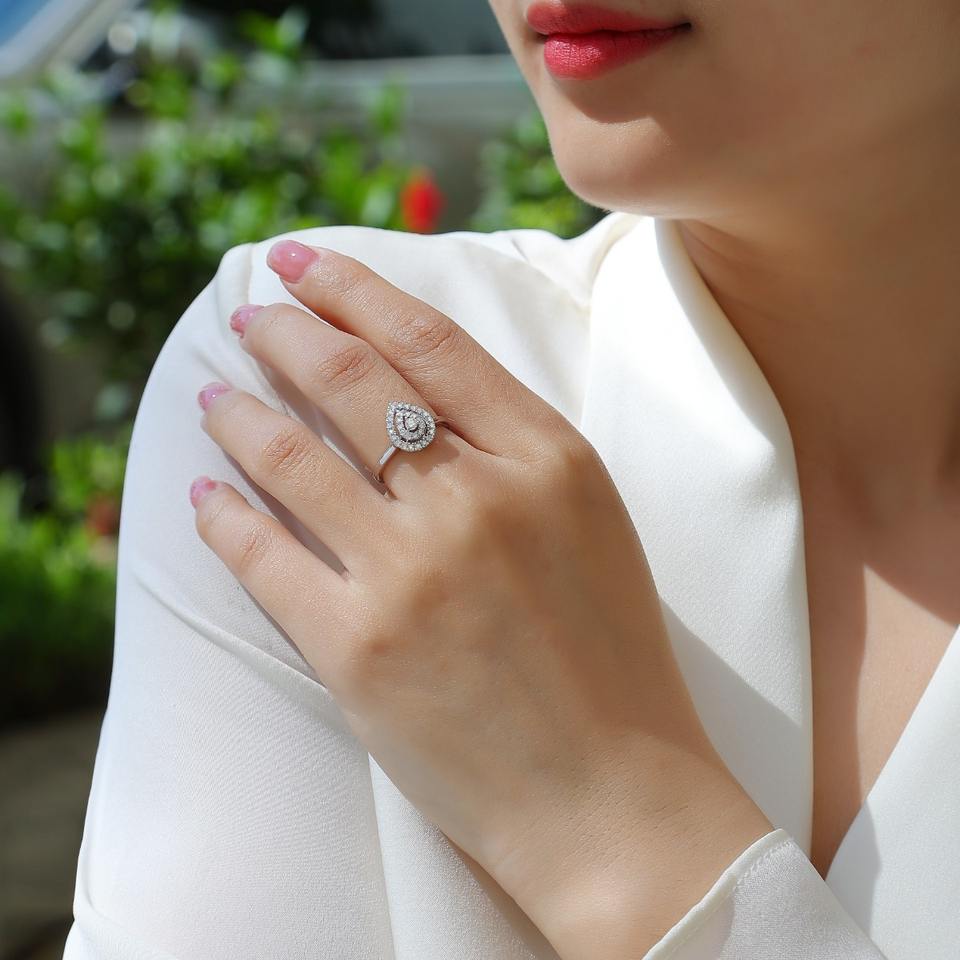 Pear Cut Halo Moissanite Ring